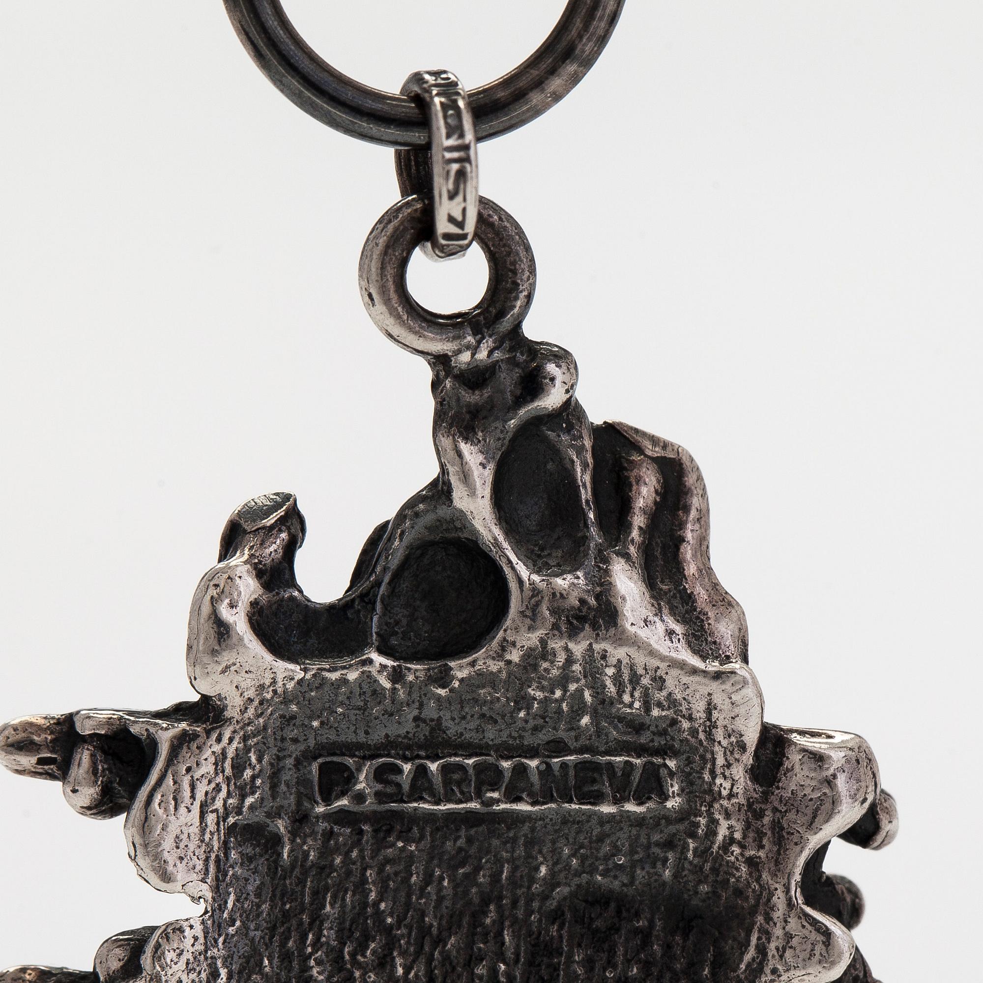 Pentti Sarpaneva, a silver and rock crystal necklace, ring and earrings, Turun Hopea, Turku.