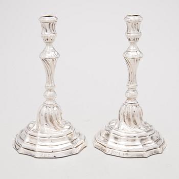 A PAIR OF SILVER 18TH CENTURY CANDLESTICKS, Louis XV.