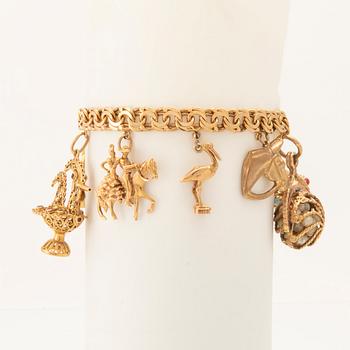 Bracelet with Bismarck chain and charms.
