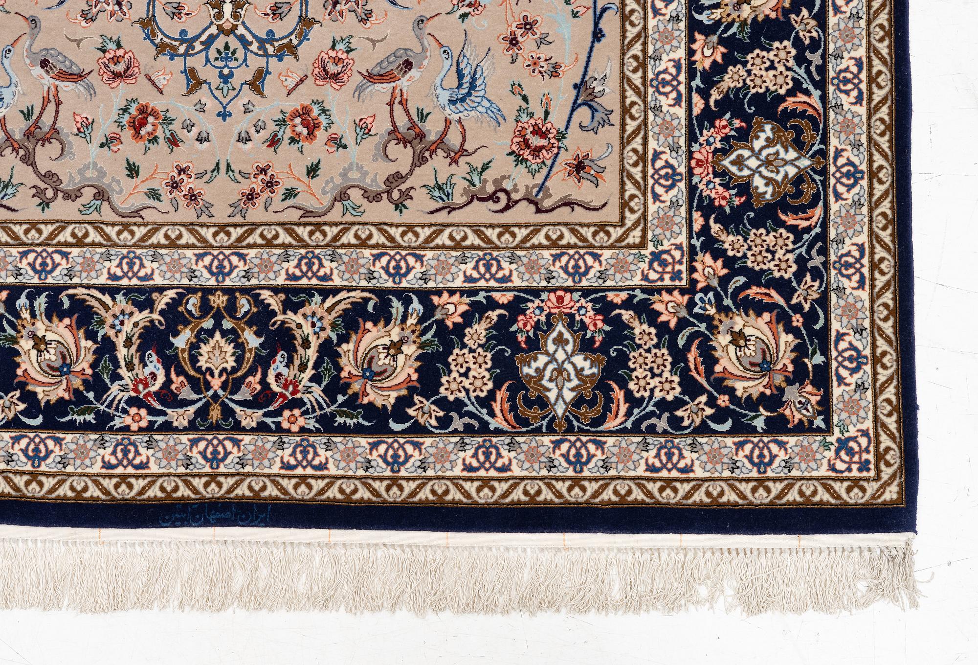 An Isfahan rug, c. 220 x 145 cm.