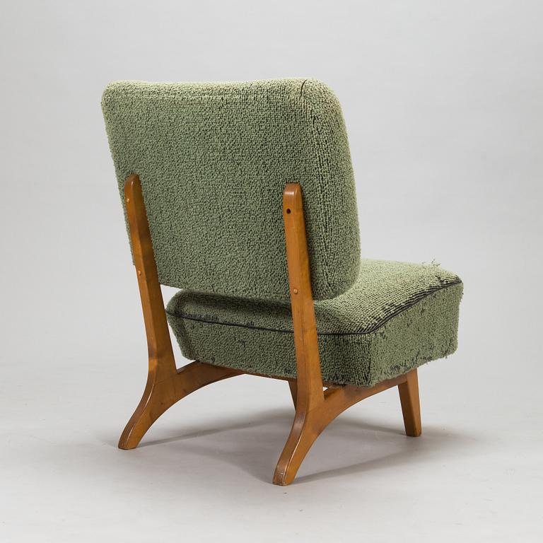 Oiva Parviainen, a mid-20th century 'Susanna' armchair for  Lahden Lepokalusto, Finland.