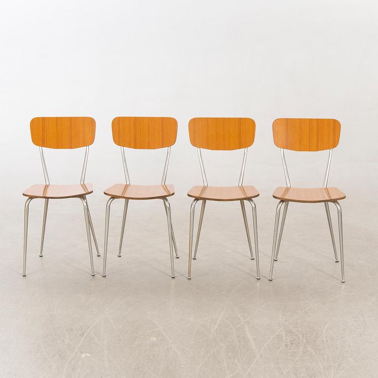 A Salvazini table and four chairs Italy 1950s.