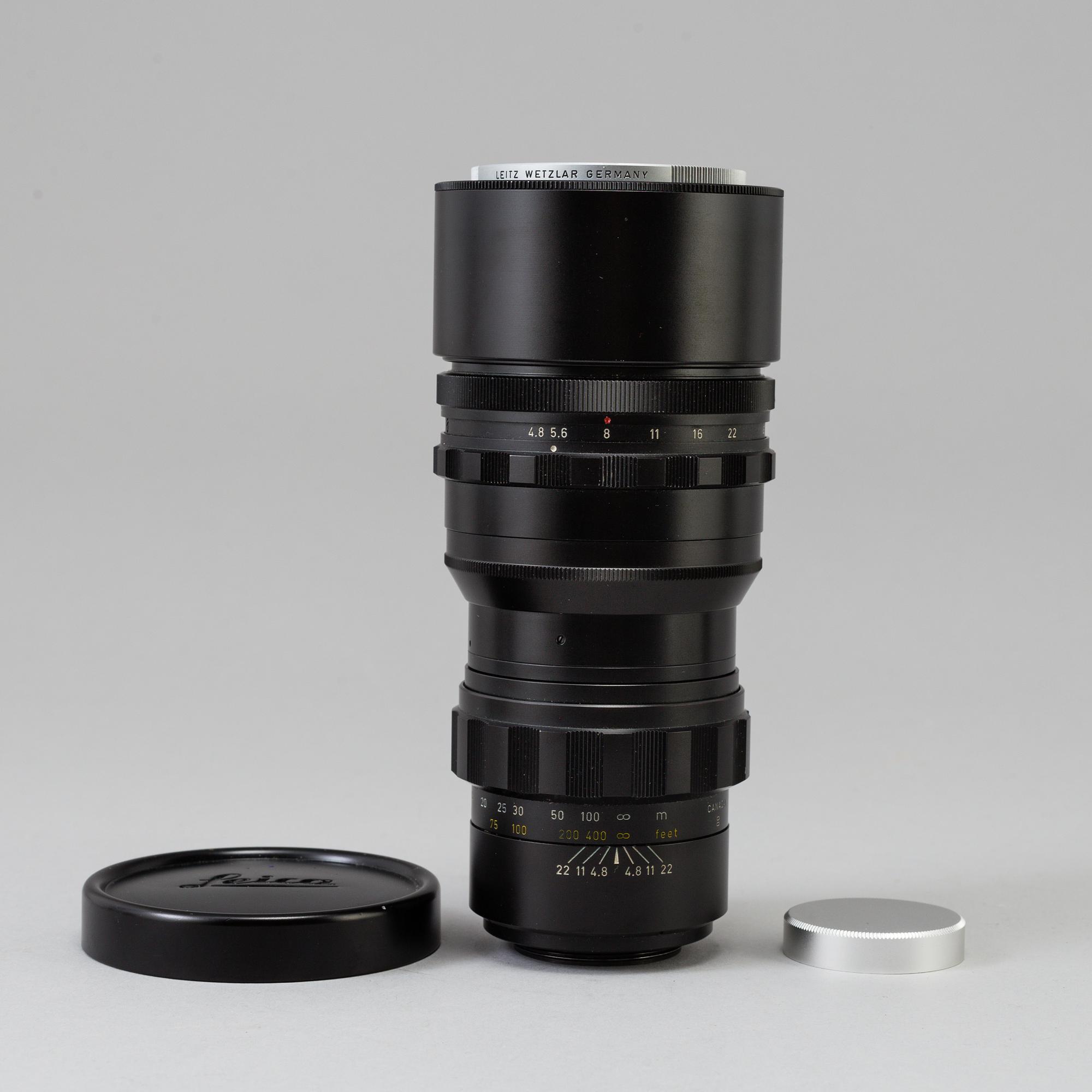 A black Leica Telyt 1:4,8/280 lens no 2298867, Leitz Canada.