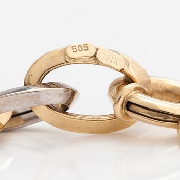 A 14K white and yellow gold necklace.
