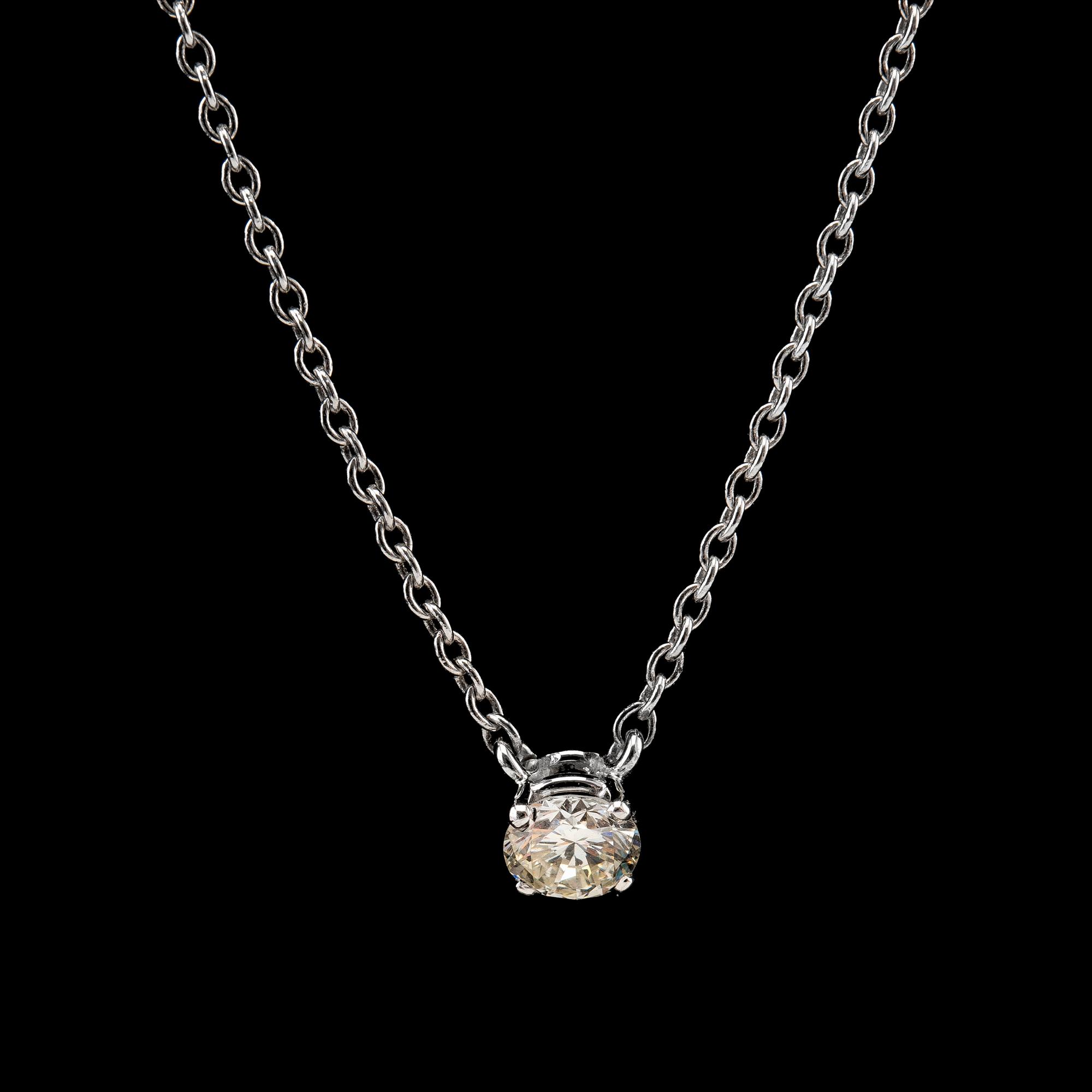 A PENDANT, brilliant cut diamond c. 0.40 ct. c. W/si 14K white gold. Length 41 cm.