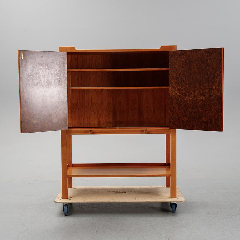A model 2135 cabinet by Josef Frank for Firma Svenskt Tenn.