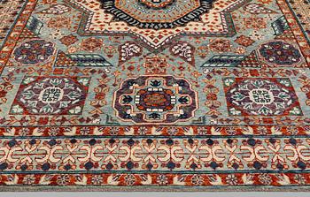 An Oriental carpet, c. 296 x 249 cm.