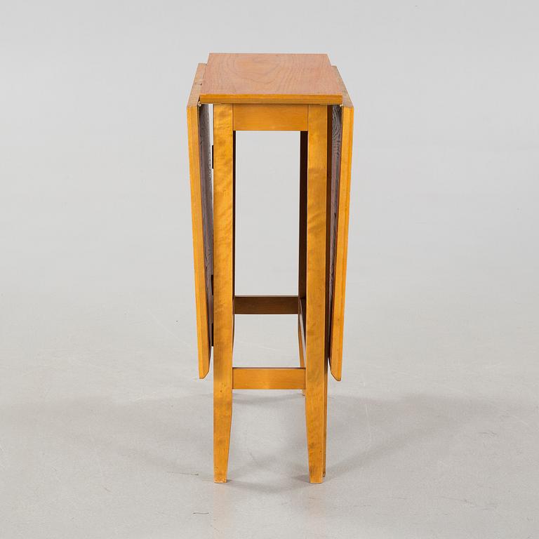 A gate-legged table by Edsbyverken in 1959.