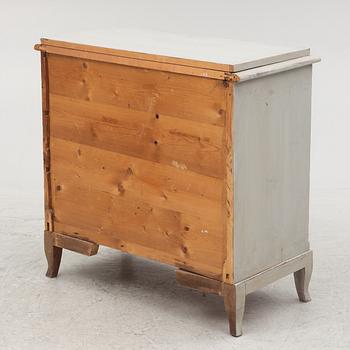 A chest of drawers, around 1900.