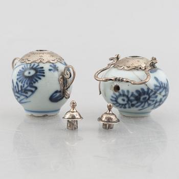 A group of six Chinese blue and white porcelain miniatures and a caddy with cover, Qing dynasty, partly Kangxi.