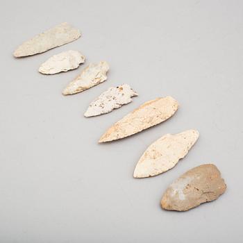 Seven flint arrow points excavated in Arizona, USA.