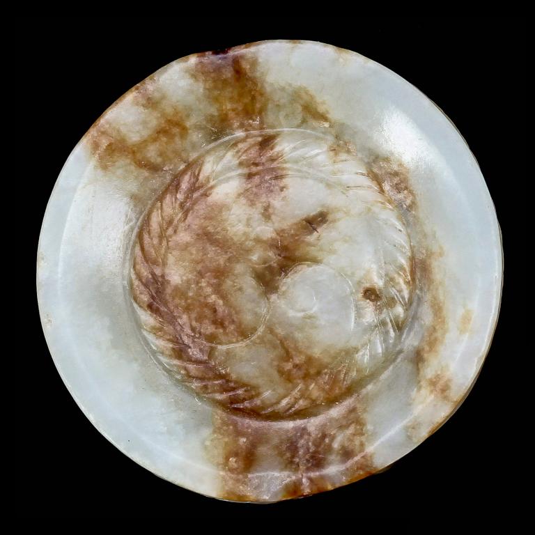 A Chinese archaistic nephrite Zong and two nephrite Bi discs.