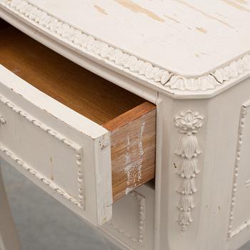 A 20th century rococo style bedside table.