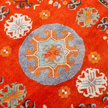 A russian or East Turkestan rug, around 224 x 130 cm.