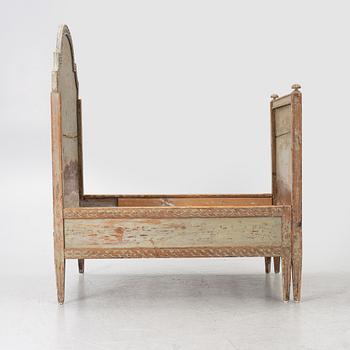 A Gustavian carved bedframe, late 18th century.