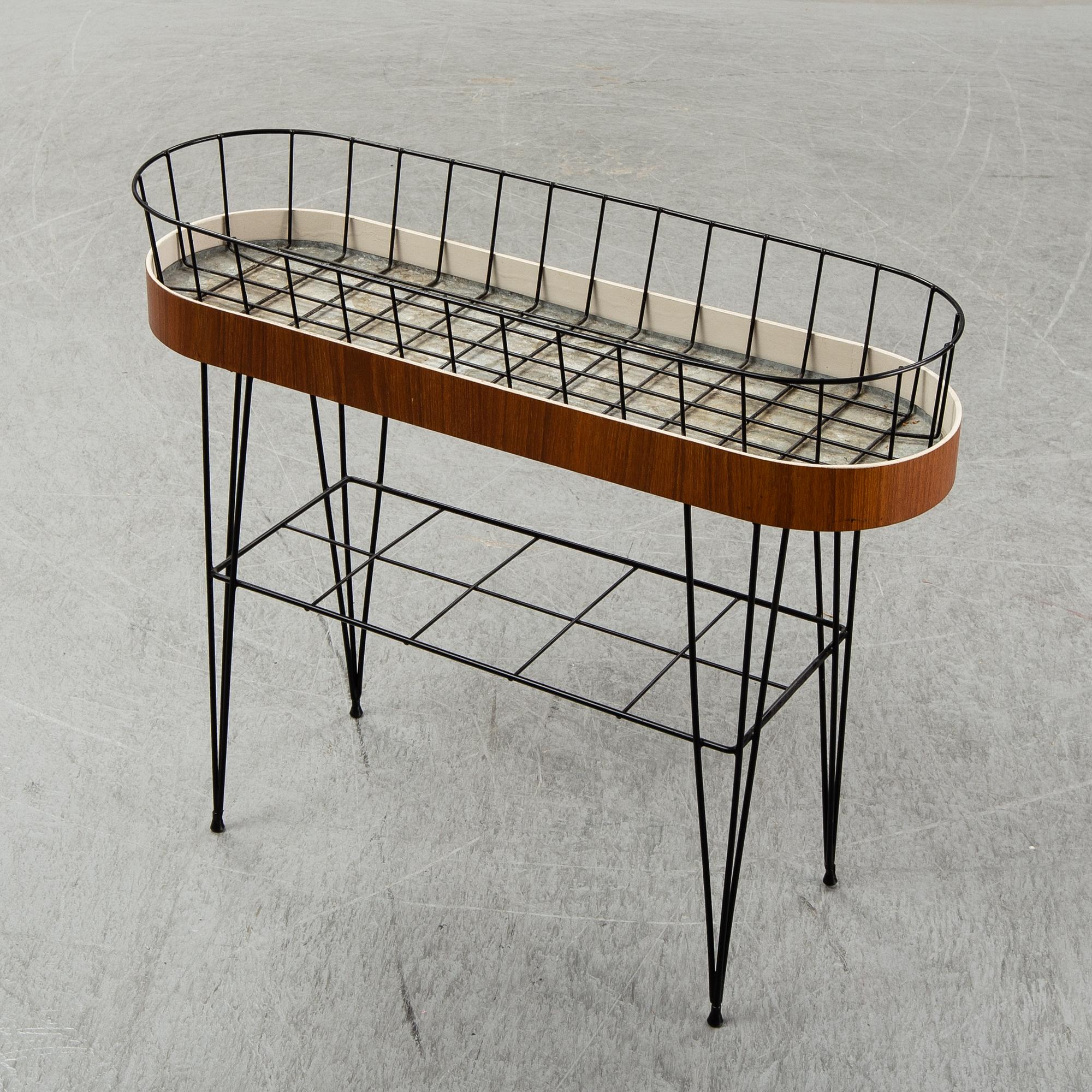 A 1950-60s plant stand.