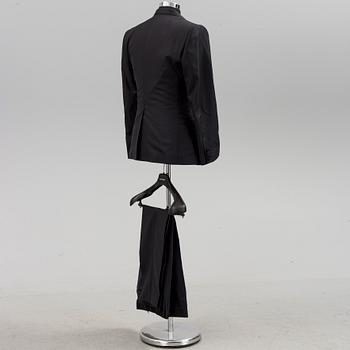 A tuxedo by Dolce & Gabbana, in size 48.