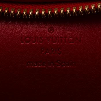 LOUIS VUITTON, "Sutton", VÄSKA.