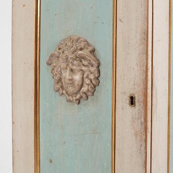 A pair of late Gustavian-style column-shaped cabinets, Stoockholm, early 19th century and later.