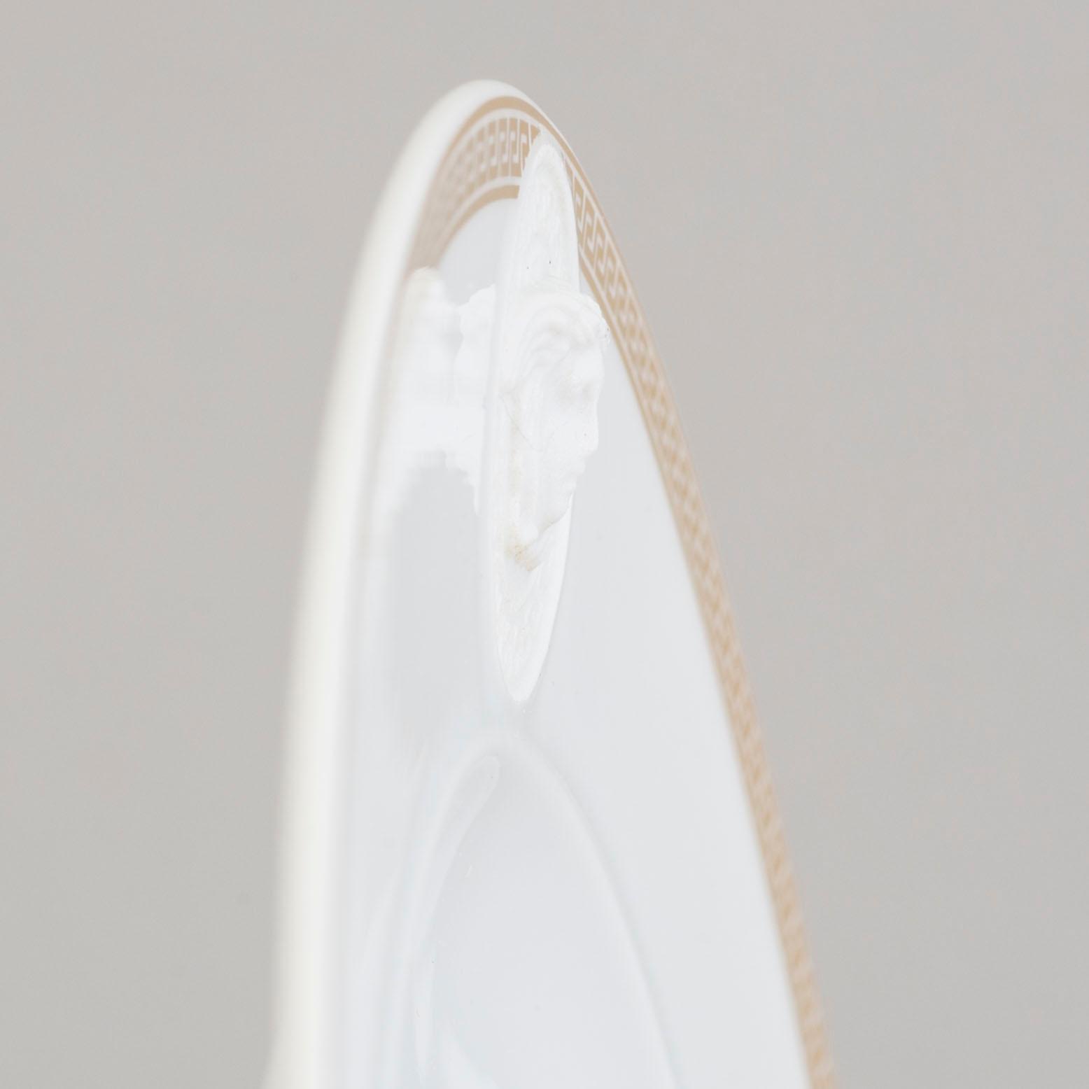 a set of 6 porcelain plates, 'Médaillon Méandre d'Or', Ikarus, by Versace for Rosenthal.