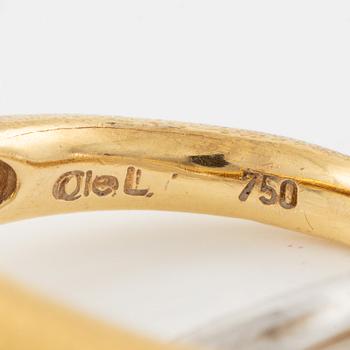 Ole Lynggaard ring "Fidelity" 18K guld och vitguld med en rund briljantslipad diamant ca 0.12 ct.