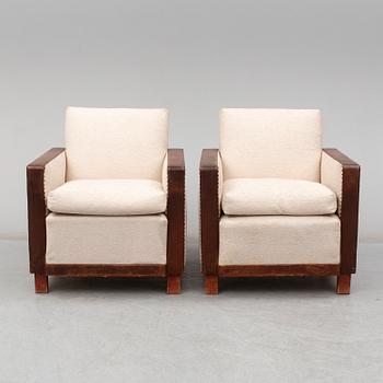 A 1930's pair of model 184 easy chairs by Björn Trägårdh, Firma Svenskt Tenn.