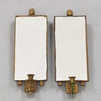 A pair of mirror sconces, 19th century.