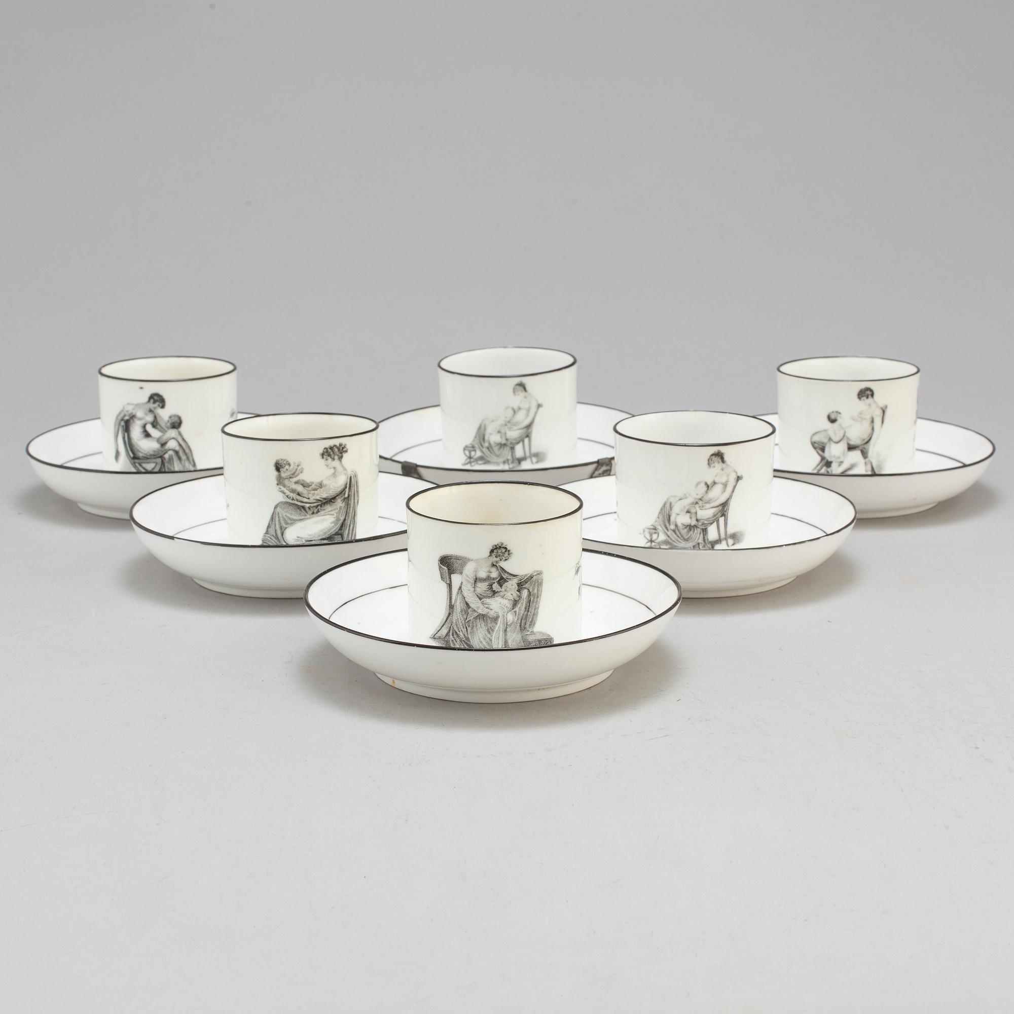 Six soft paste cups with saucers, early 19th century.