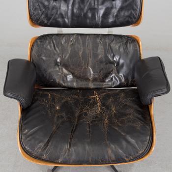 An easy chair and ottoman by Charles & Ray Eames, Herman Miller, USA, produced with licence by Hille, London.