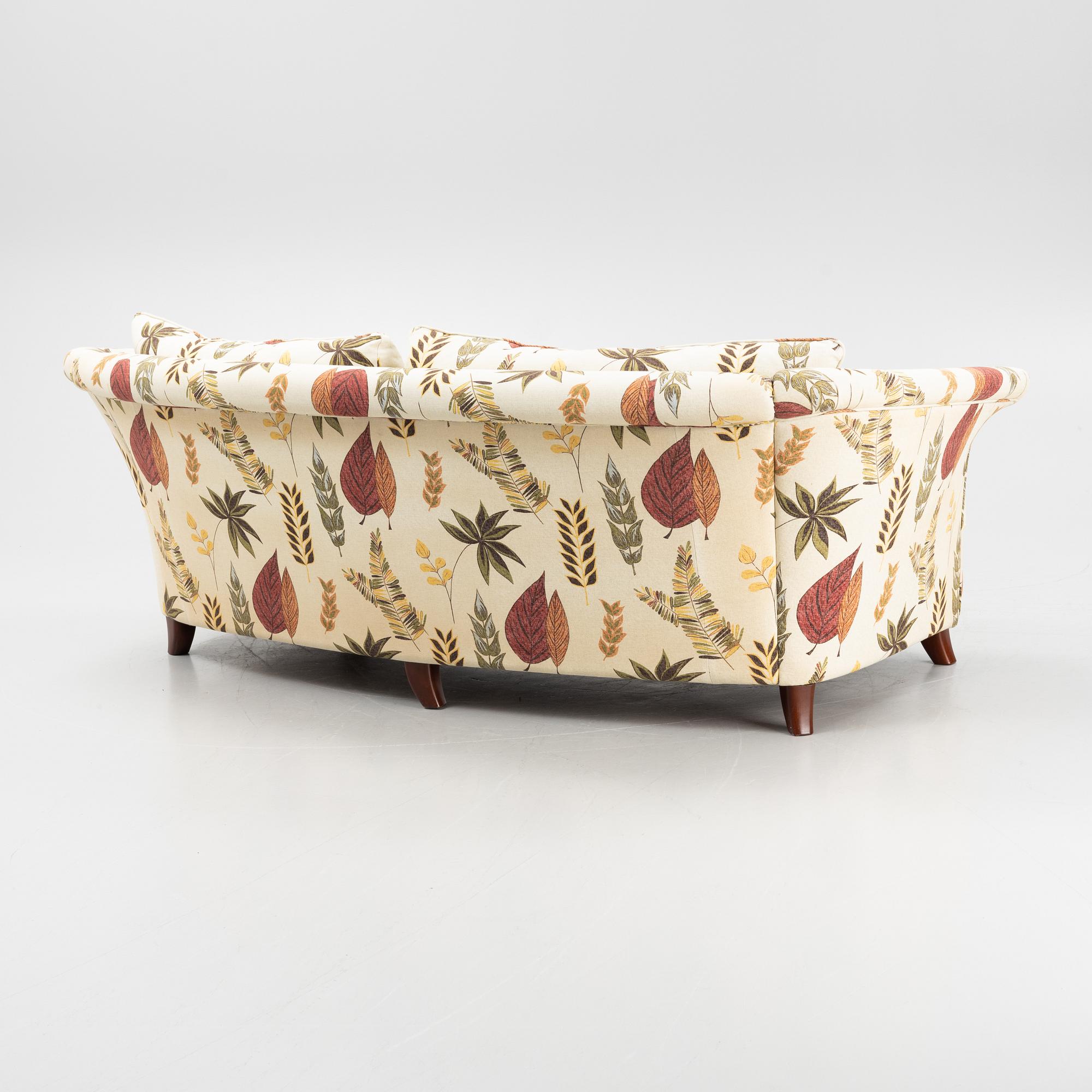 A curved sofa from Bröderna Andersson.