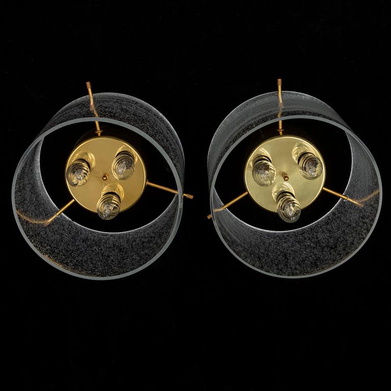 A pair of late 20th Century ceiling light by Kjell Munch.