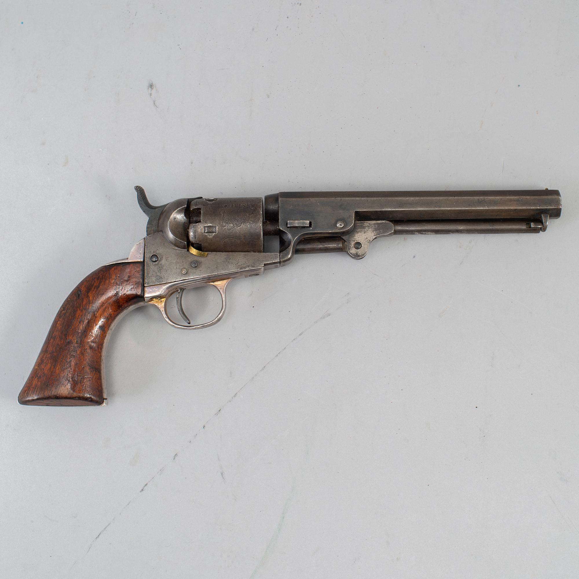 A Colt 1849 pocket percussion revolver with serial no 92569.