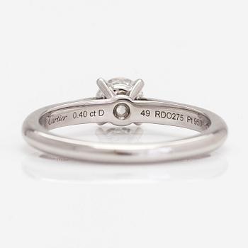 Cartier, ring, platina och briljantslipad diamant ca 0.40 ct. Med GIA dossier.