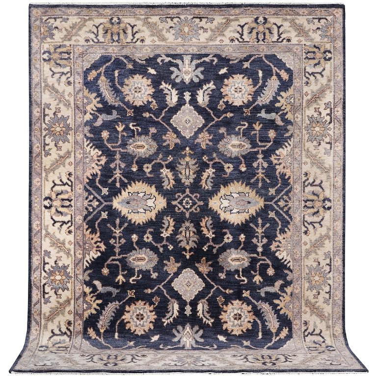 A Mamluk design carpet, c. 305 x 245 cm.