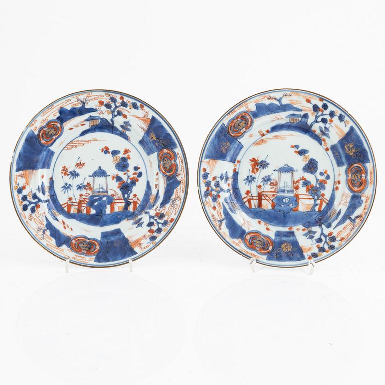 An Imari porcelain bowl and a pair of plates, Qing dynasty, China, 18th century.