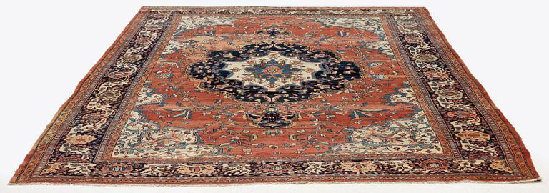 An Antique Sarouk carpet, West Persia, c. 353 x 260 cm.