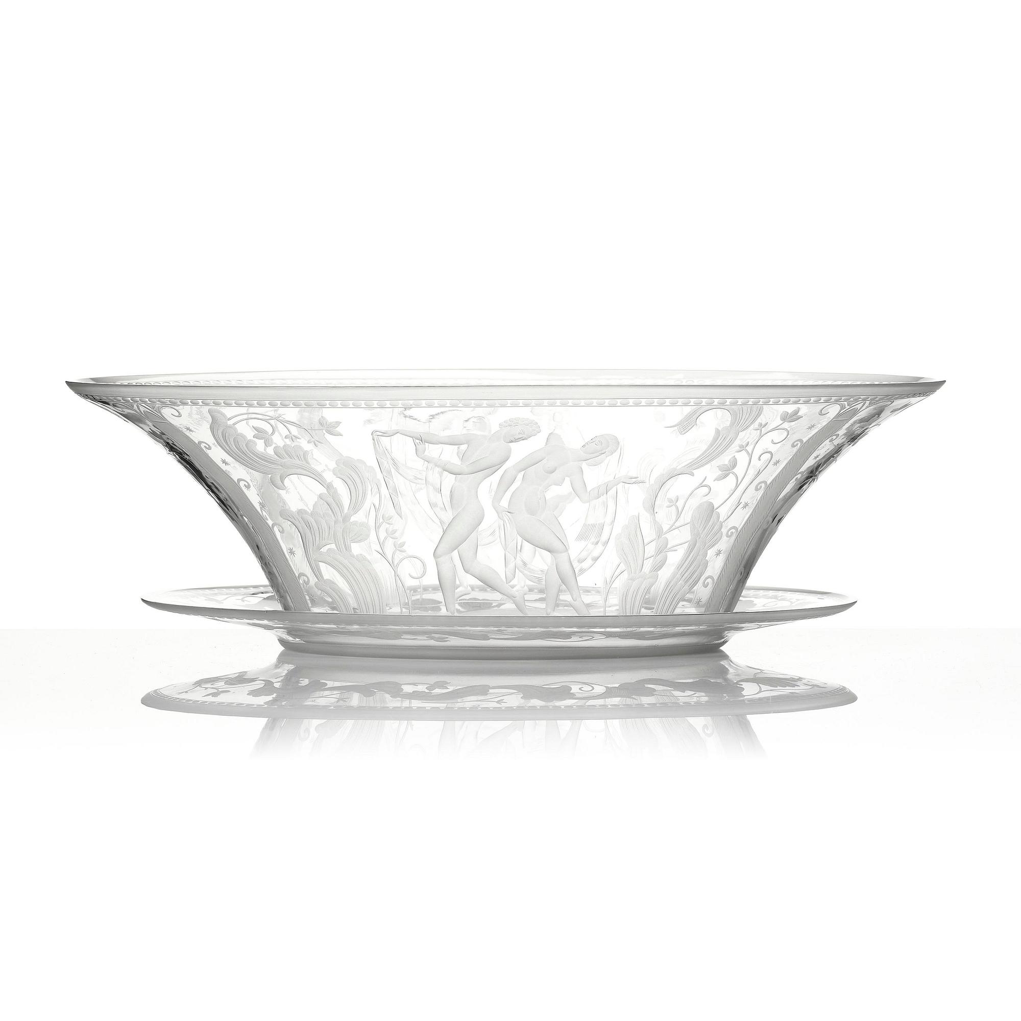 Simon Gate, an engraved Swedish Grace glass bowl on a plate, Orrefors, Sweden 1926, model 147.