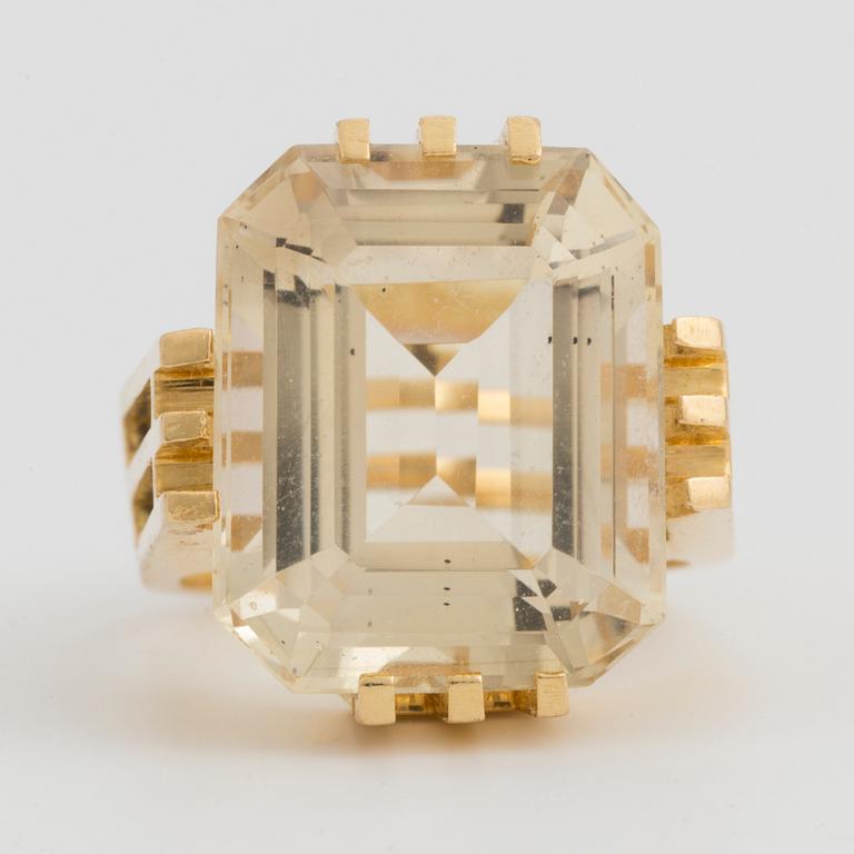 An emerald-cut citrine.