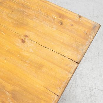 A table with a drawer, 19th century.
