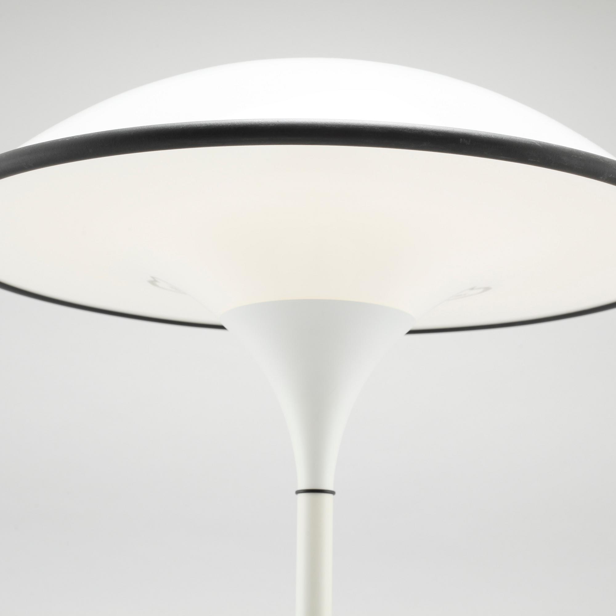 A table lamp by Preben Jacobsen for Fog & Mørup, model "Cosmos", designed in 1984.