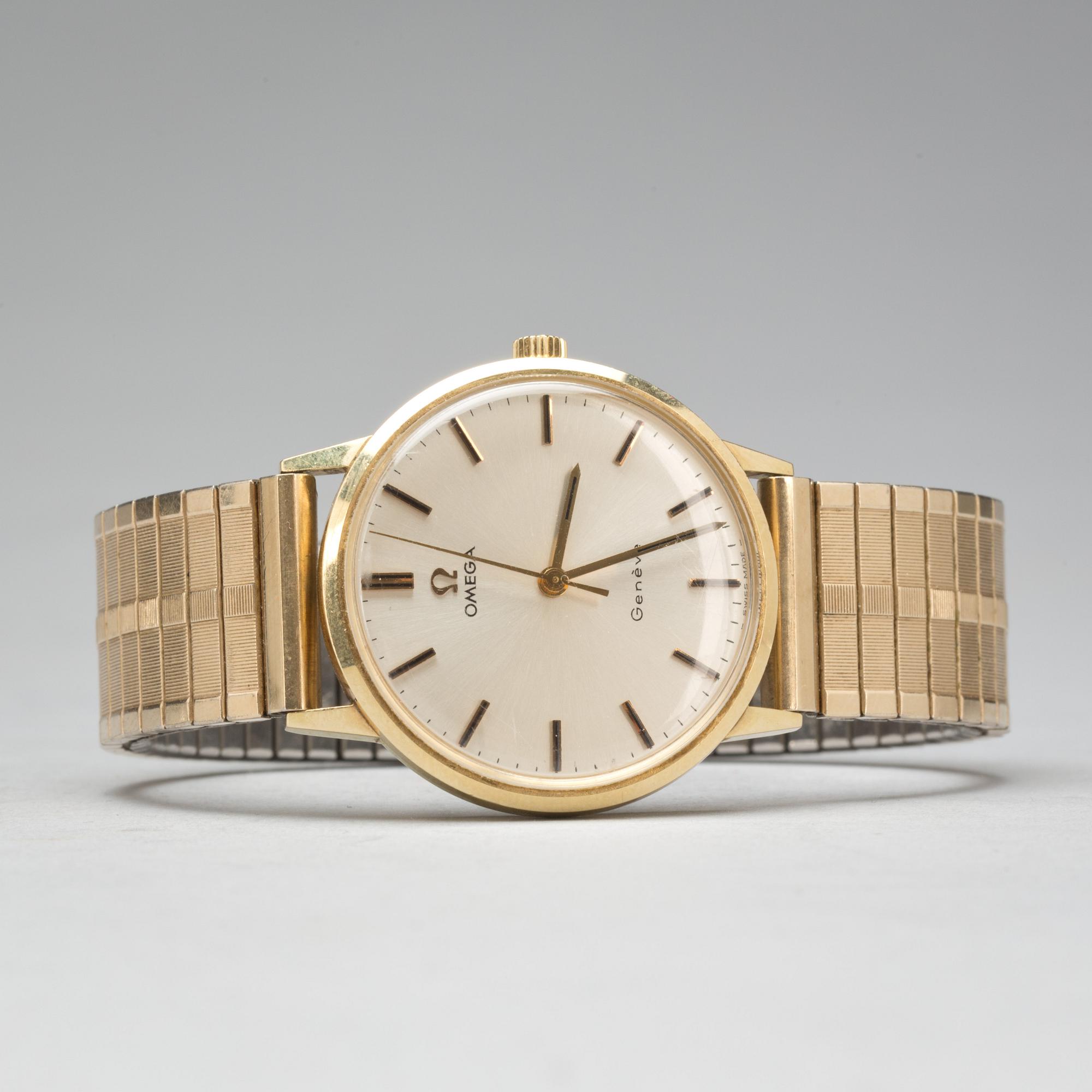 ARMBANDSUR, herr. Omega Genève. 14K guld.