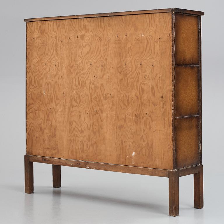 Otto Schulz, a Swedish Modern Zodiac patterned cabinet for Boet, Gothenburg, 1930-1940s.