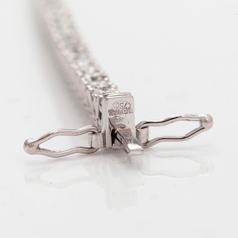 Tennis bracelet, brilliant-cut diamonds, 18K white gold.