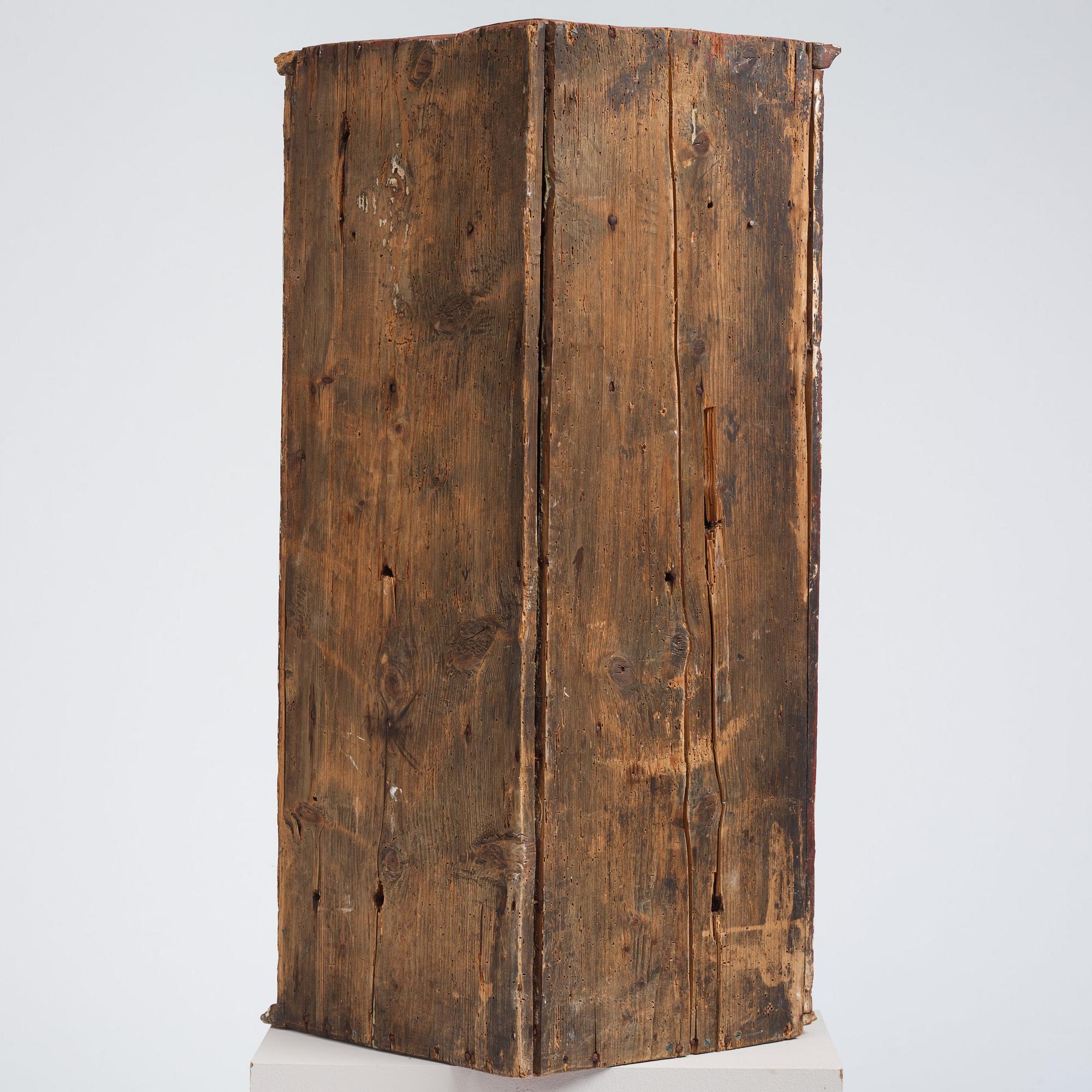 A Swedish late Baroque polychrome-painted corner cabinet, mid 18th century.