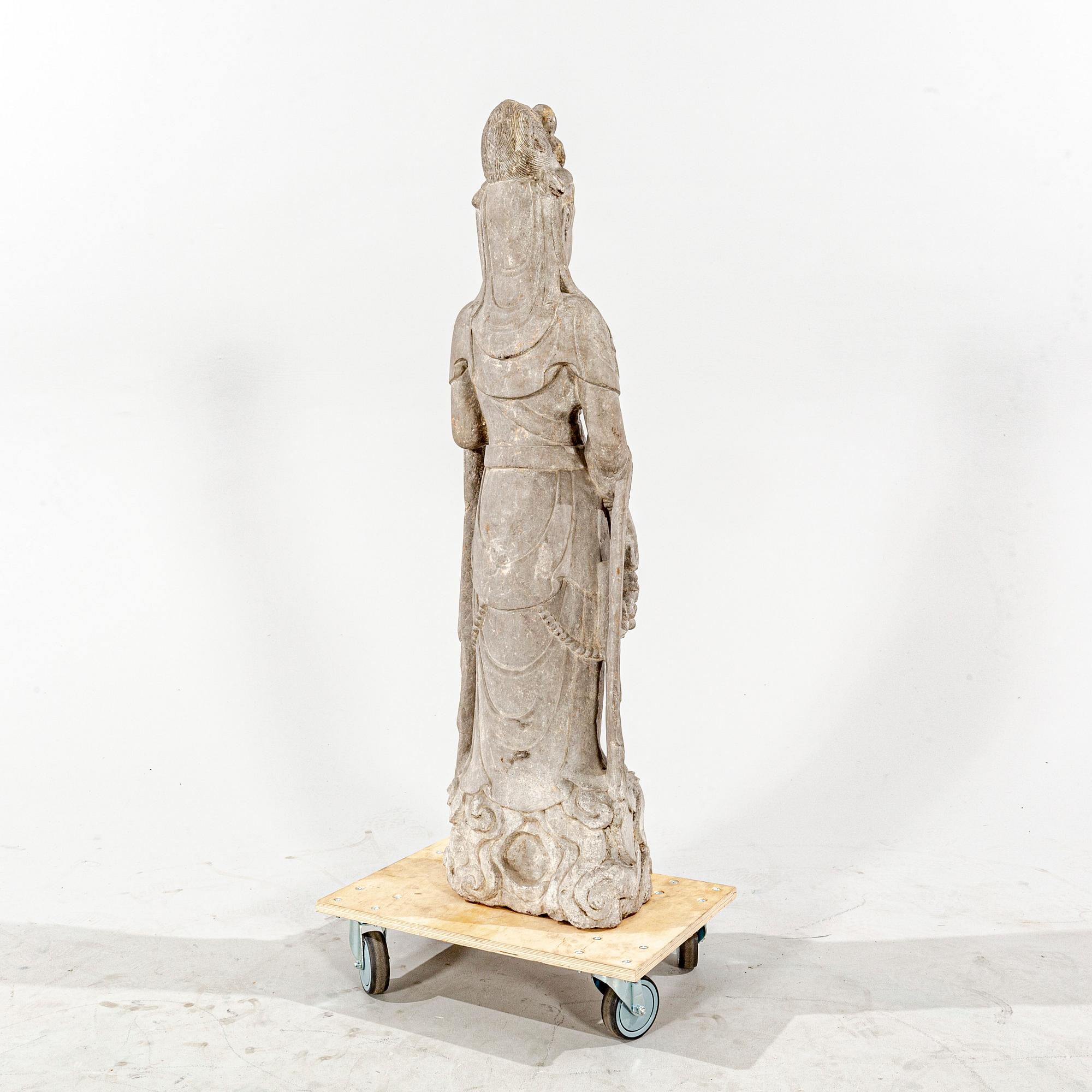 A stone sculpture of Boddhisattva, 20th Century.