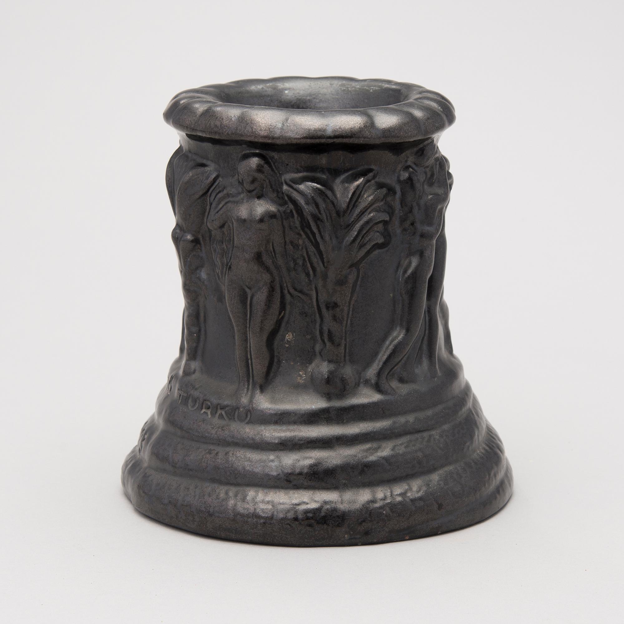 a plaster decoration bowl, signed Aarre Aaltonen 1923.