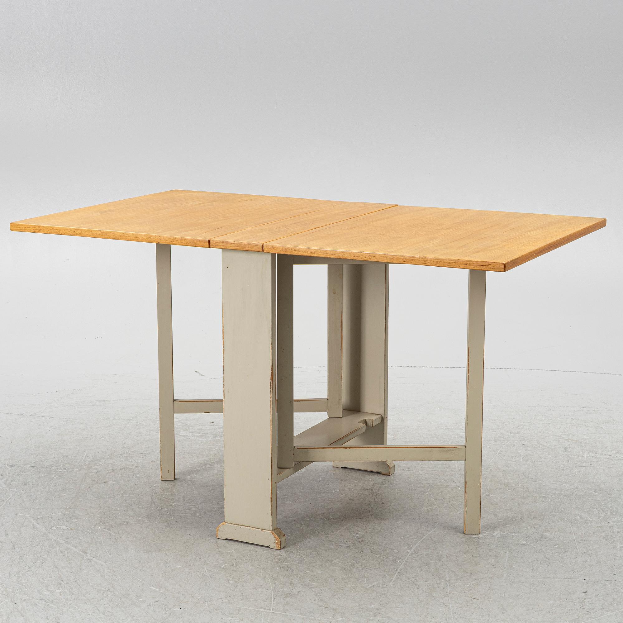 Carl Malmsten, a drop-leaf table, "Vapensmeden", second half of the 20th century.