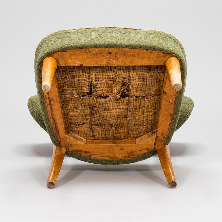 Lisa Johansson-Pape, a 1940's armchair for  Keravan Puusepäntehdas, Stockmann.