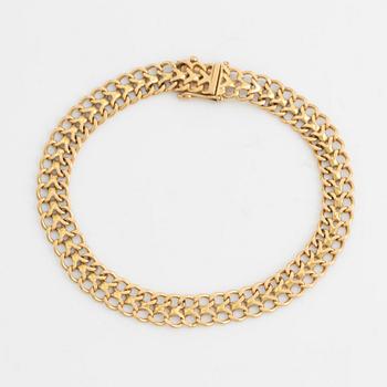 18K gold bracelet.