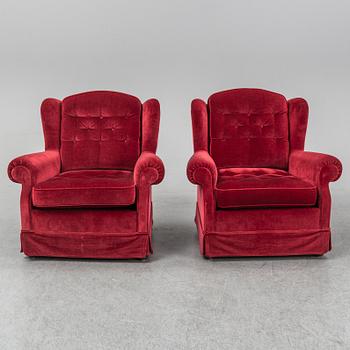 Apair of easy chairs.